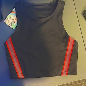 I’m selling a never used target sports bra very comfortable with red stripes